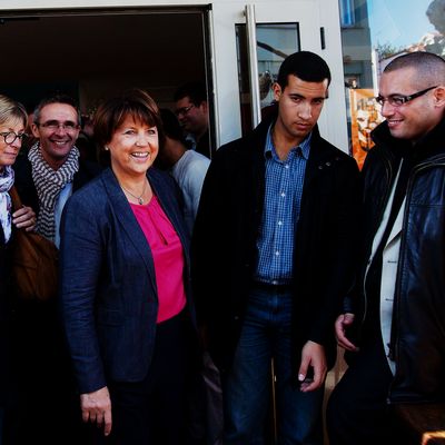 Alexandre Benalla providing close protection to Martine Aubry, First Secretary of the French Socialist Party