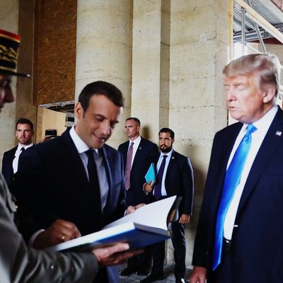 Alexandre Benalla with President Emmanuel Macron and President Donald Trump at Les Invalides, Paris, 2017